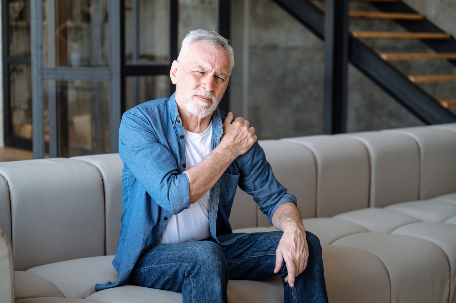 Senior Male Medicare Patient in Pain Photo