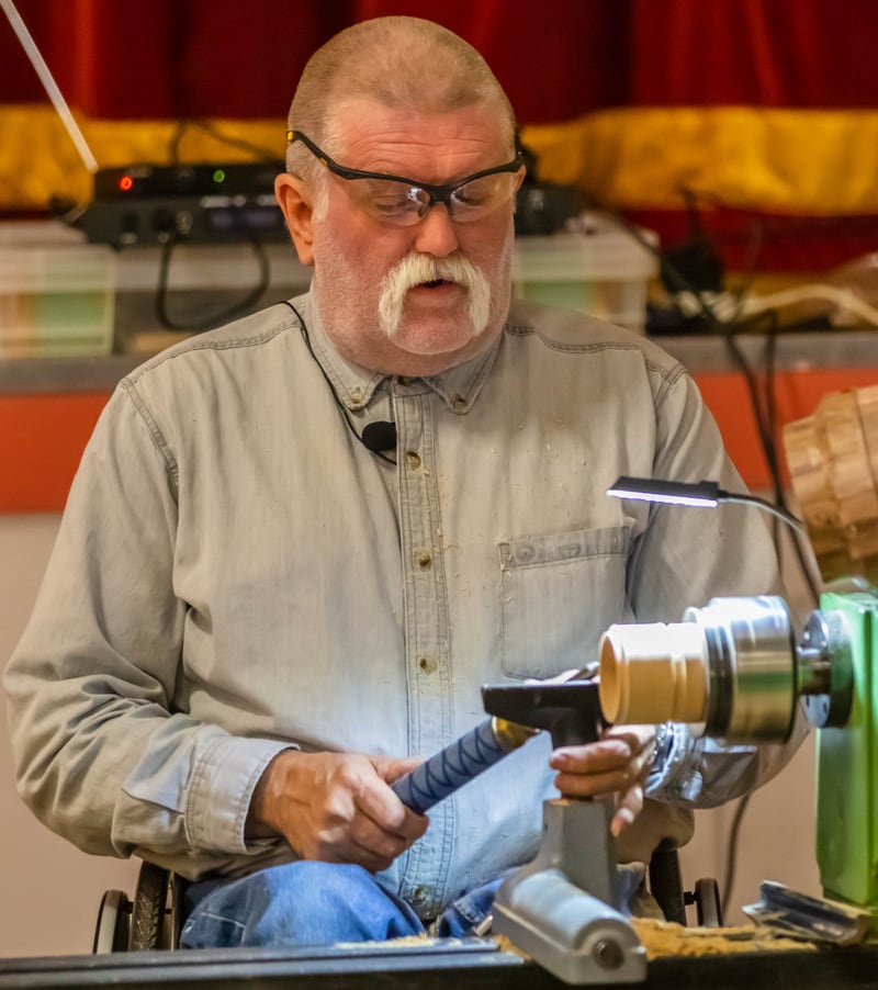 I like to turn at a lathe set at just above my seated elbow level