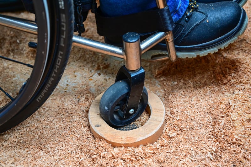 I never use brakes on my wheelchair, preferring agility, but when turning I sometimes need something to prevent me from disappearing backwards in the middle of a cut