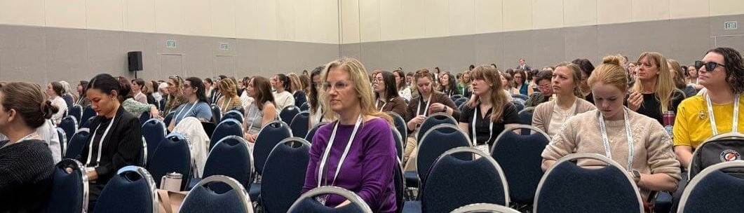 Attendees listening during a past CSM education session