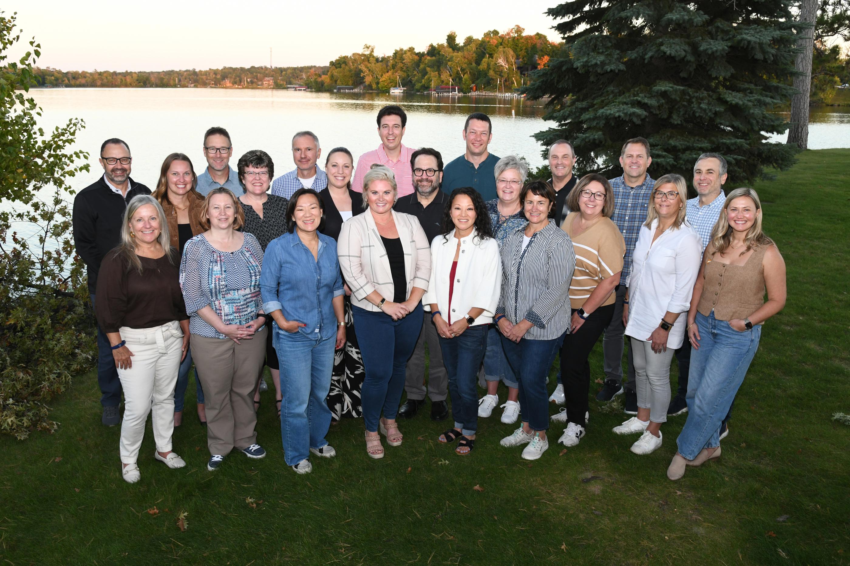 Association leaders gathered together beside the lake