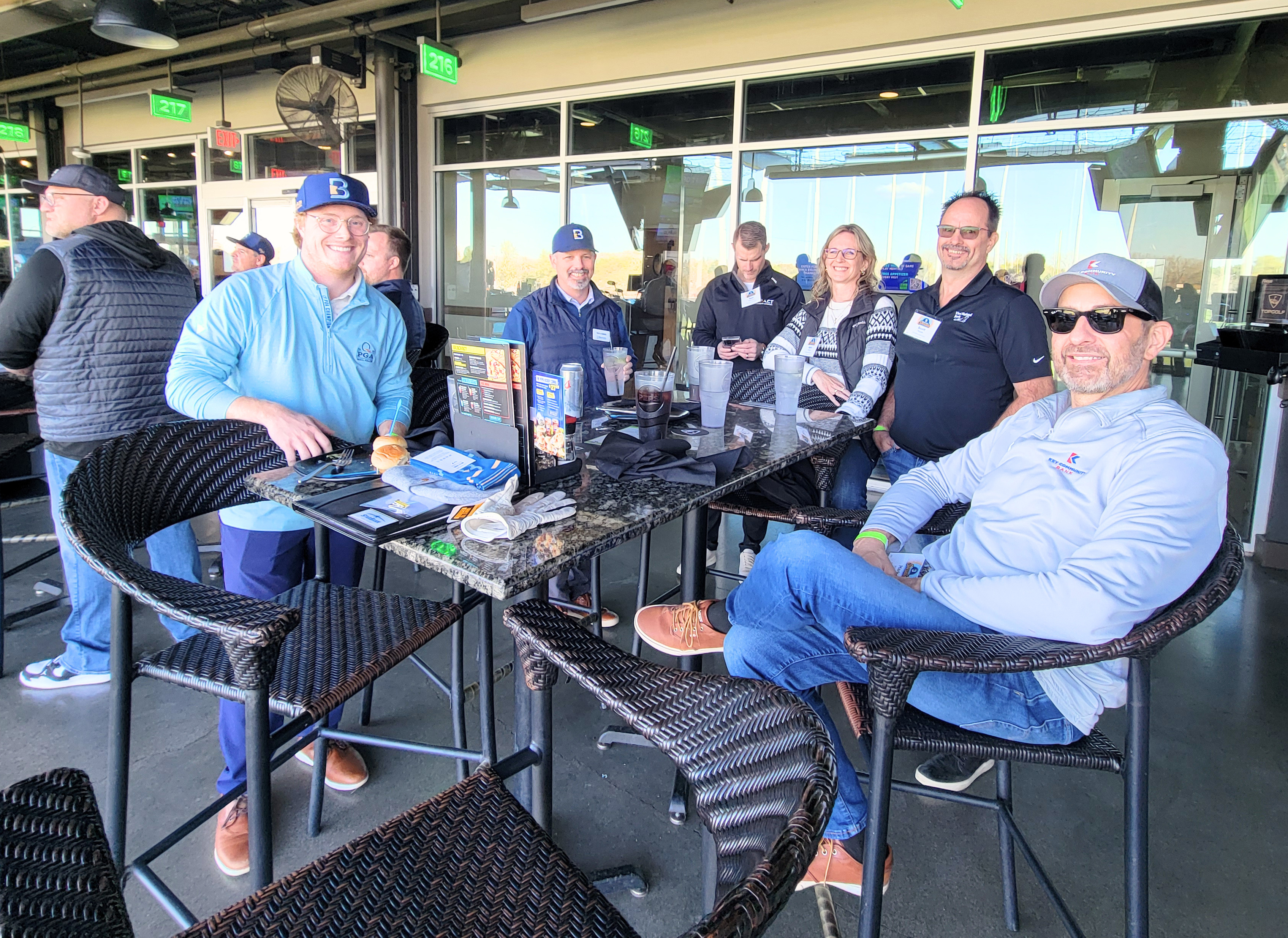 BankIn Minnesota members enjoy an event at Topgolf
