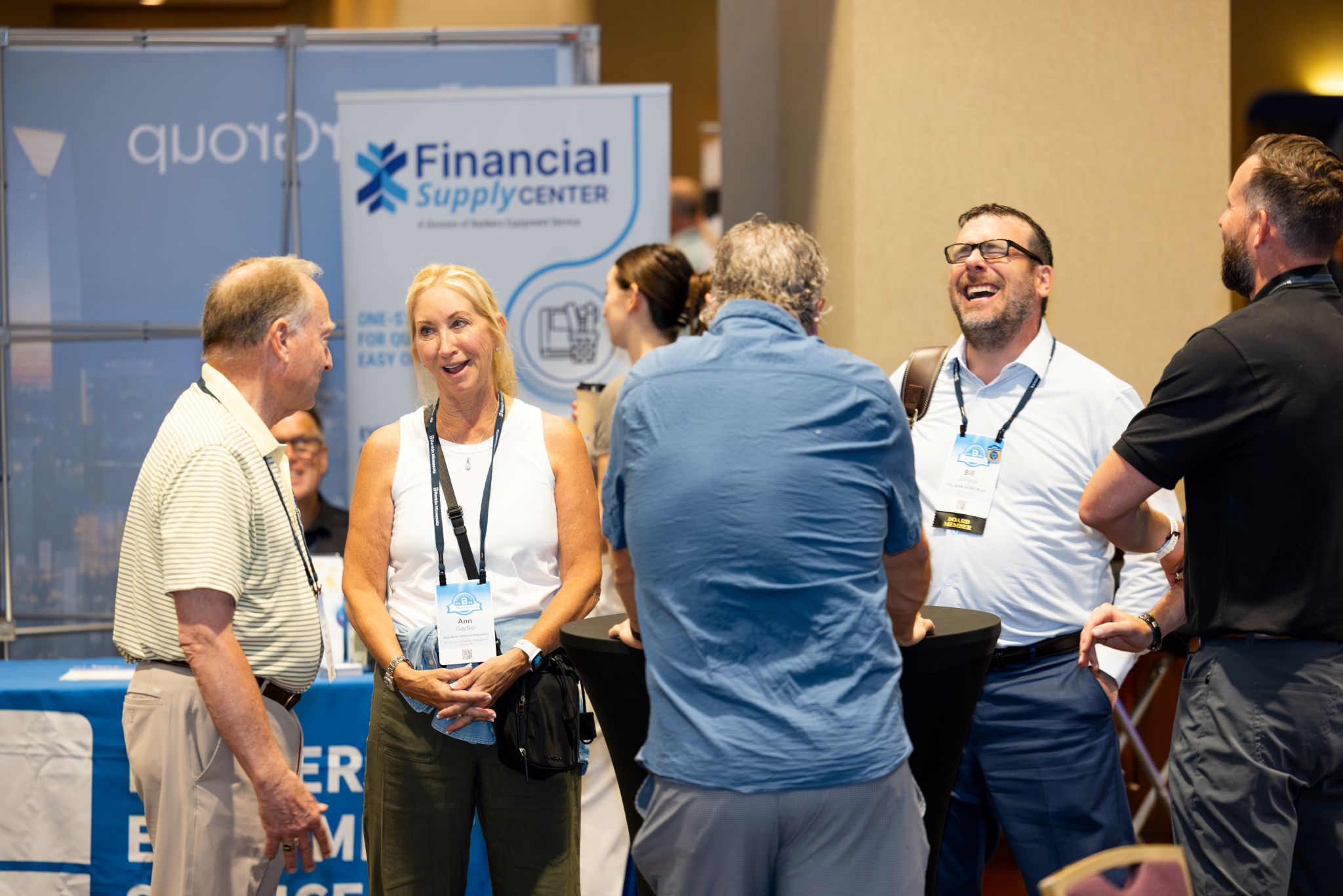 BankIn members laugh together at an event