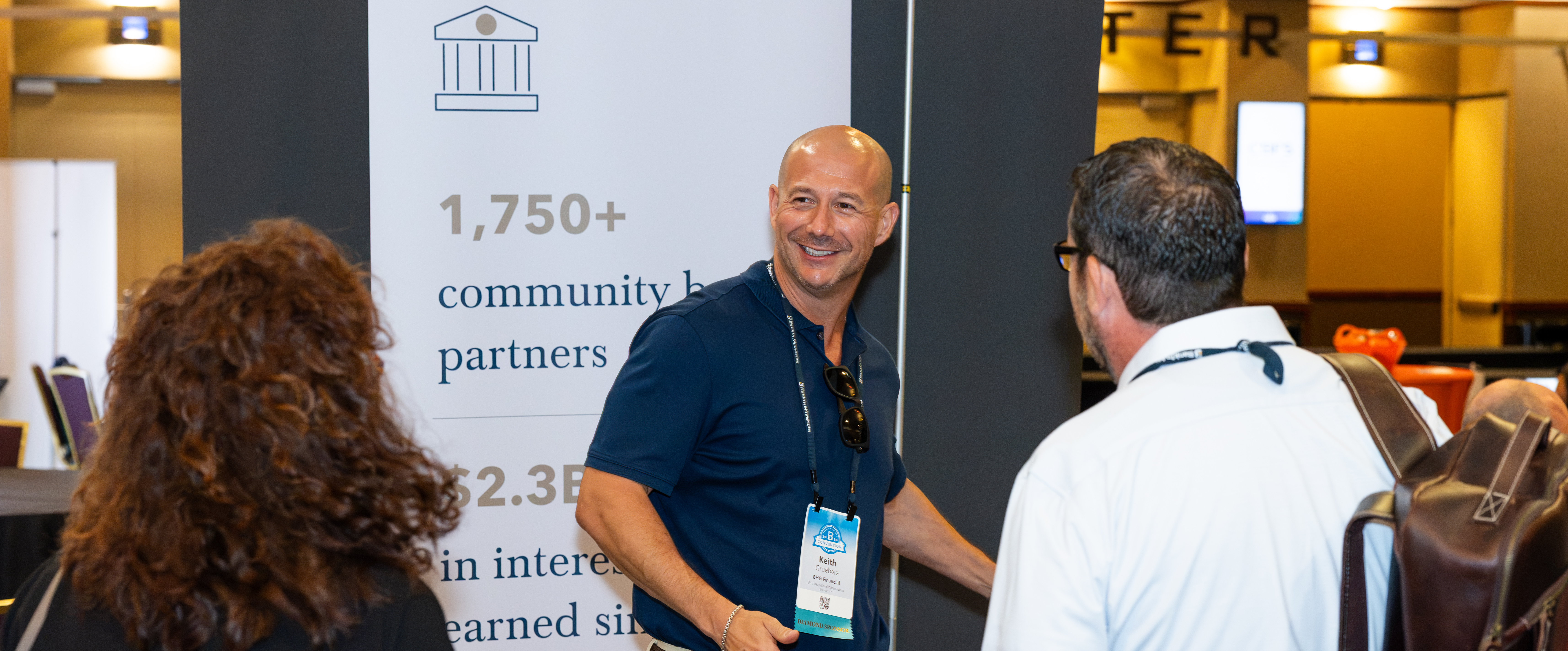 An Associate Member interacts with BankIn Minnesota bank members.