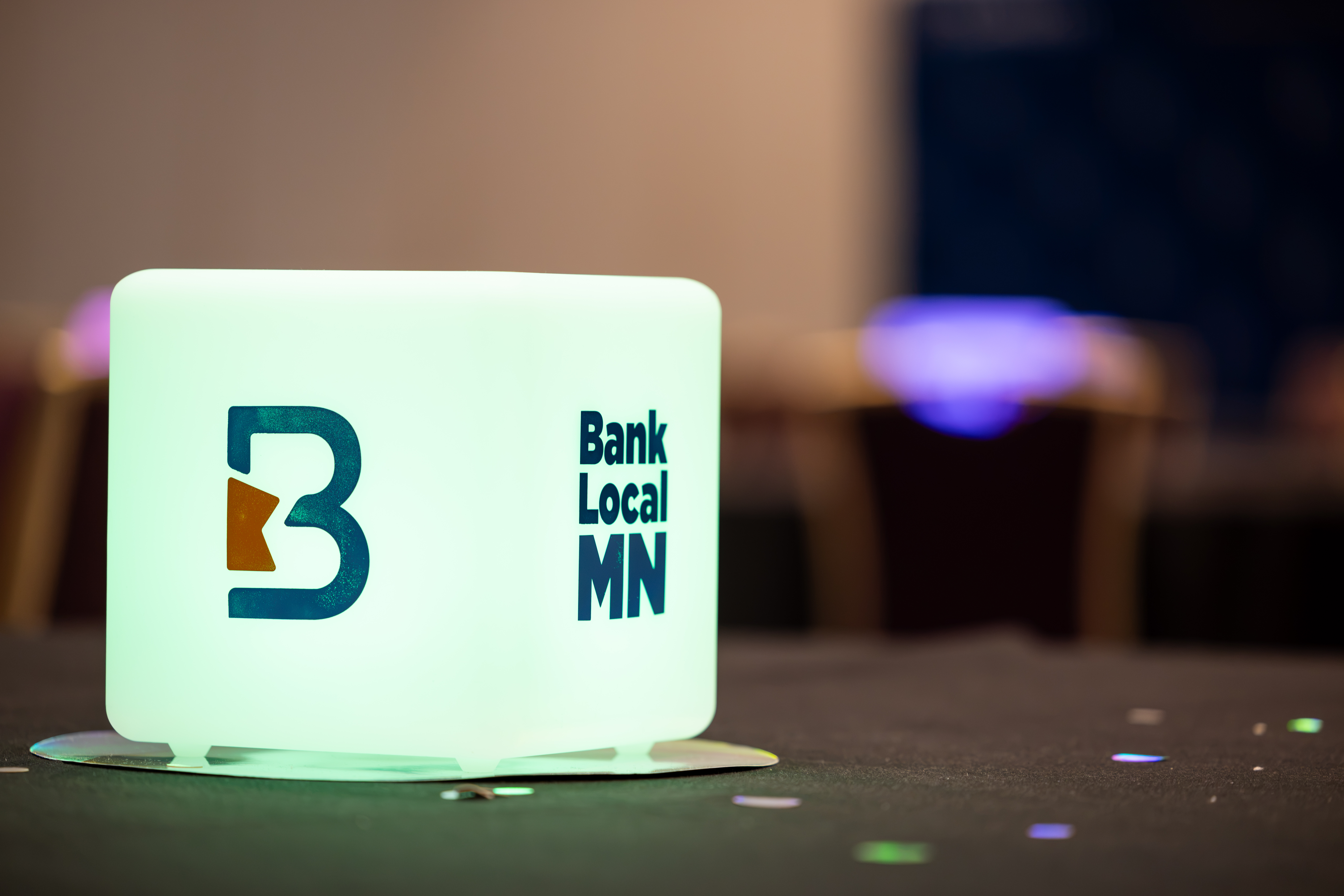 Illuminated Bank Local MN sign at a BankIn Minnesota event