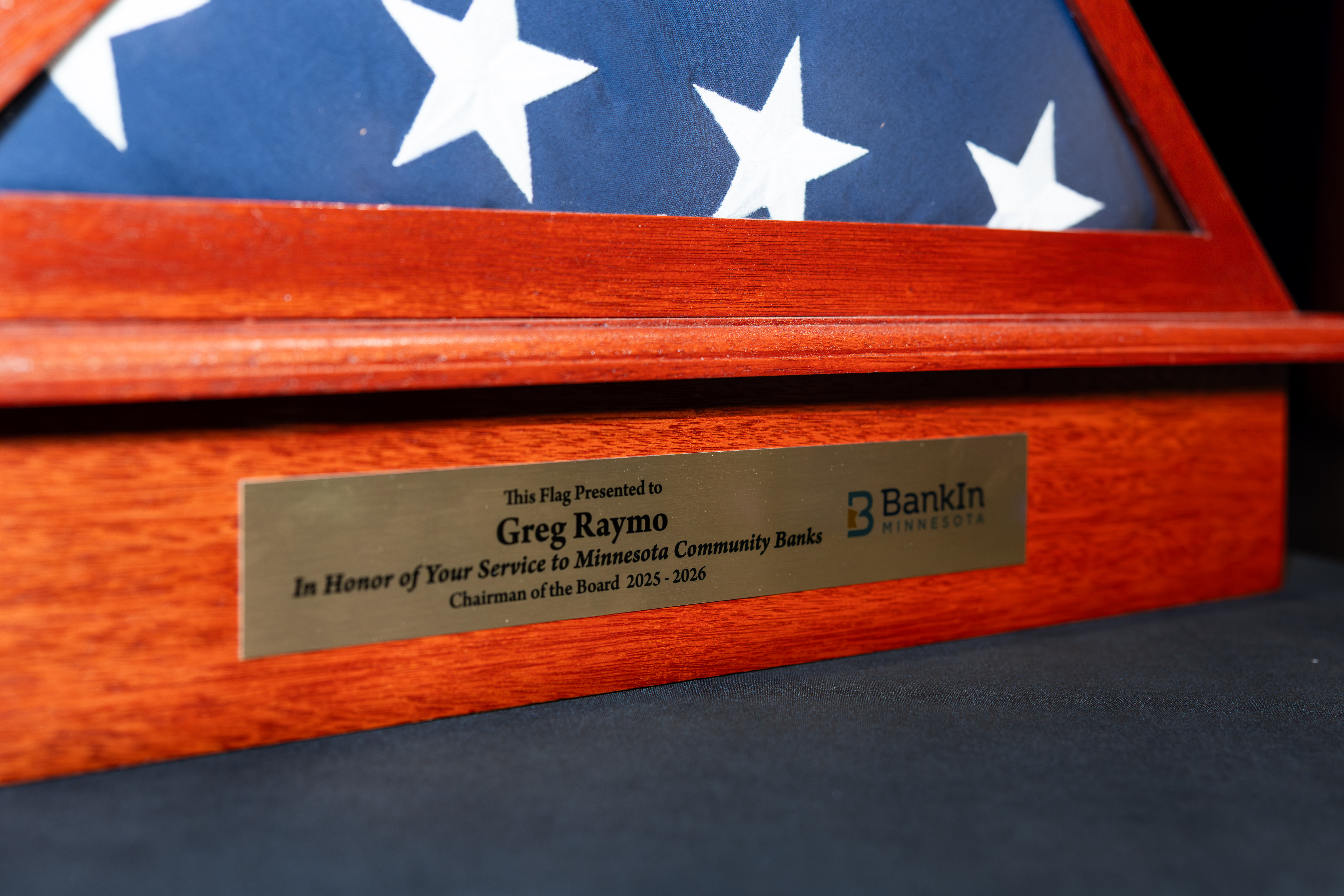 Flag case honoring past chairman