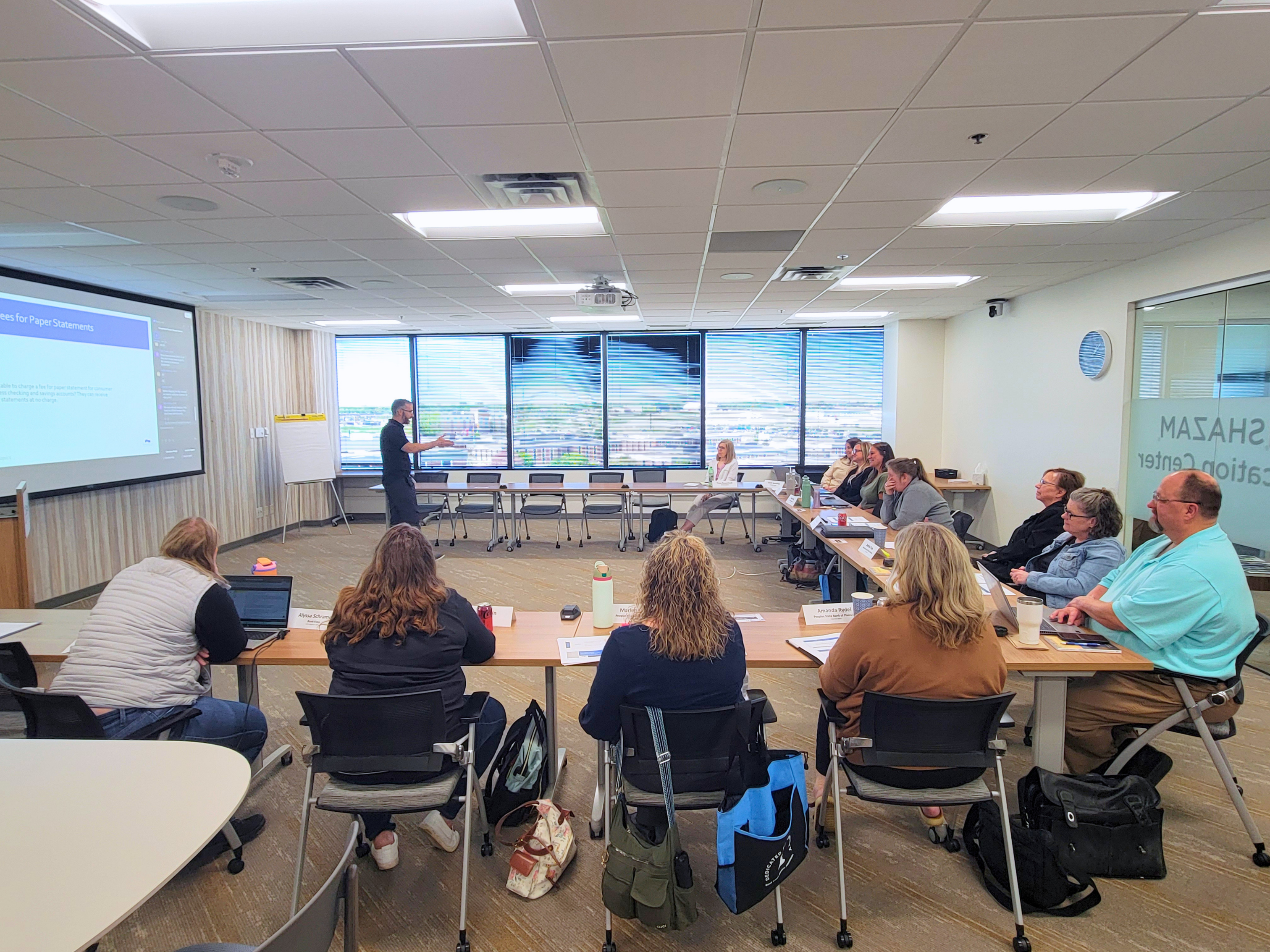 BankIn members participate in a training in Bloomington.
