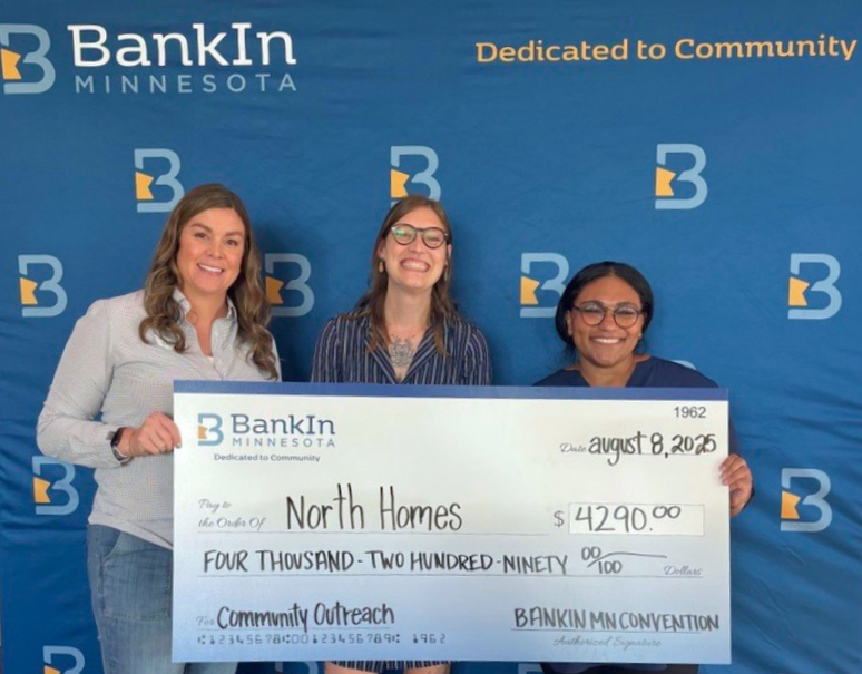 BankIn Minnesota presents a Convention Community Impact Initiative donation to North Homes Children and Family Services in 2025.