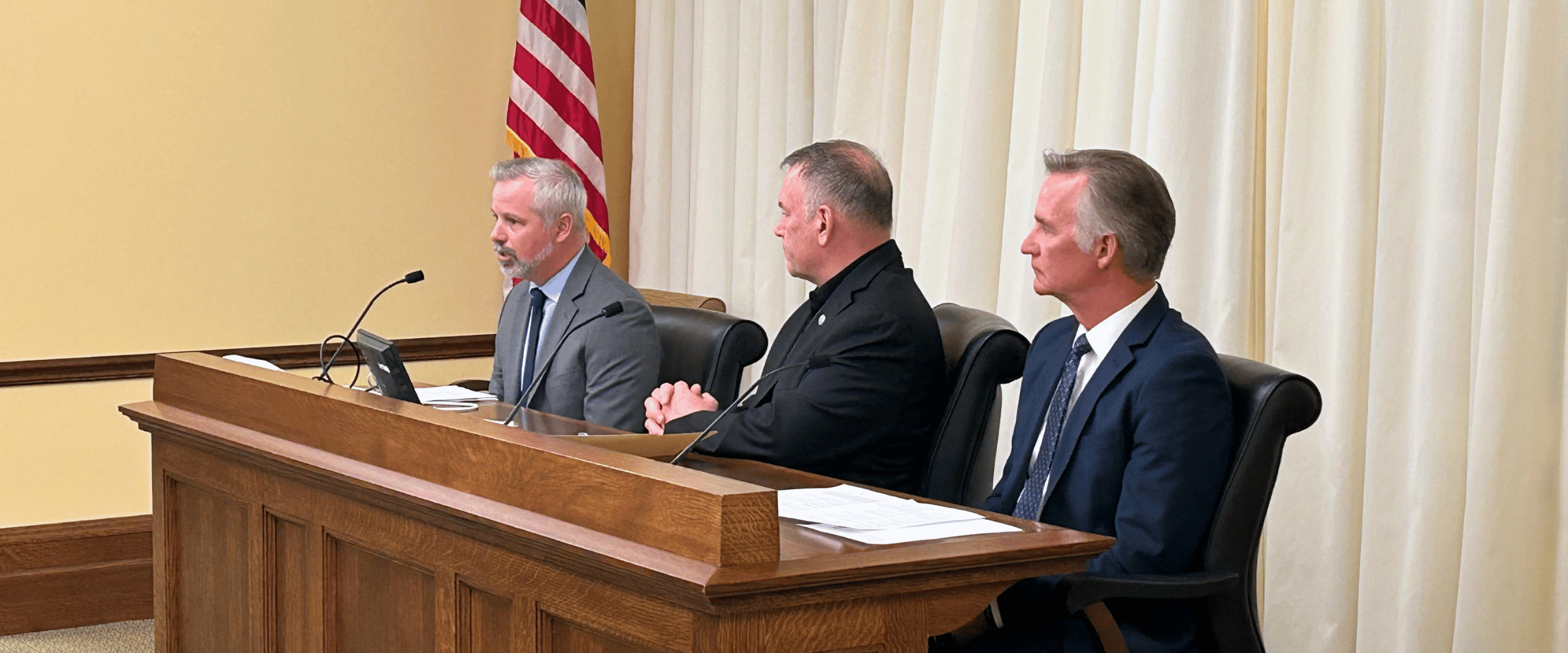 BankIn Minnesota President and CEO Rich Jones and Granite Bank President and CEO Jerry Reiter testify at a Minnesota legislative hearing on community bank tax relief.