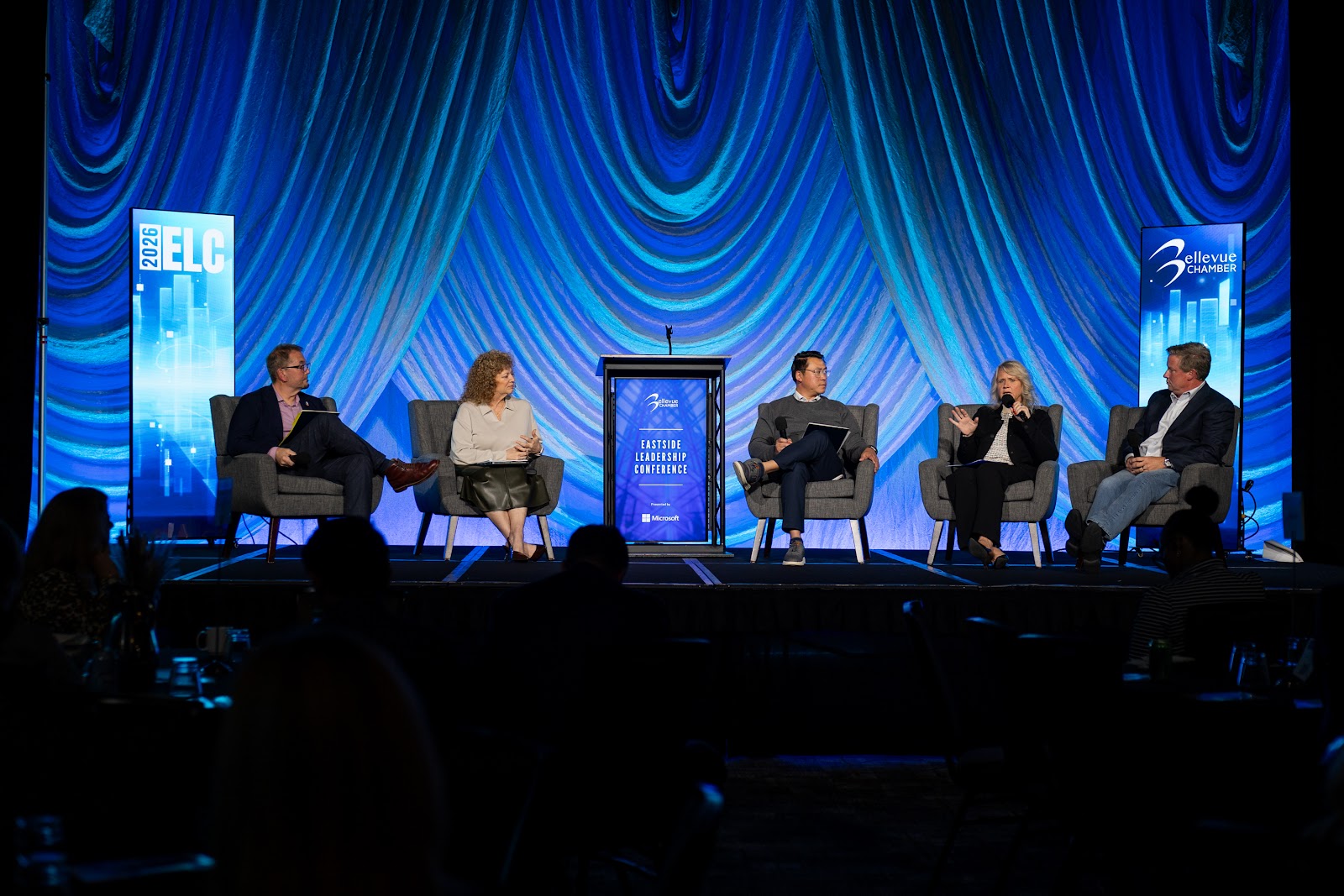 Four mayors and moderator Joe Nguyen on the main stage for Strong Mayors, Straight Talk