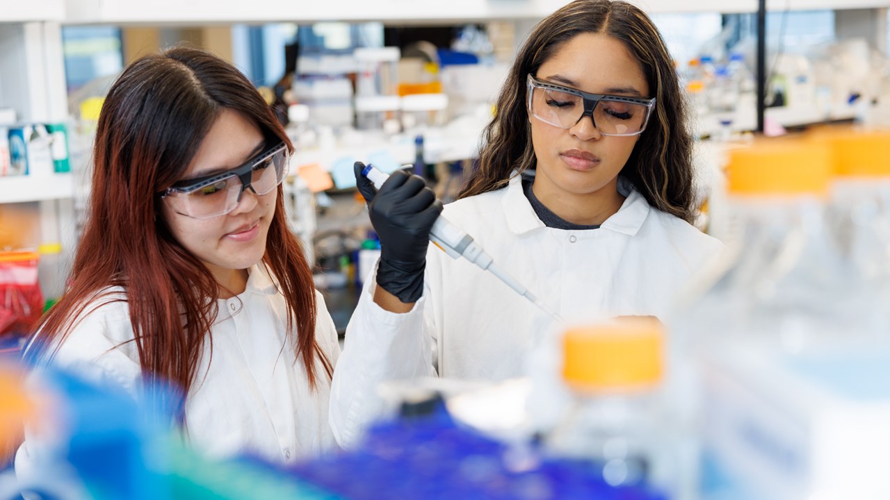 Monod Bio Press Photo showing two female employees working in their lab. By Ludeman Photographic