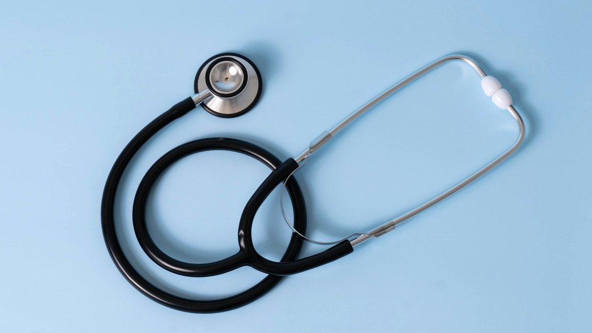 A stethoscope on a desk