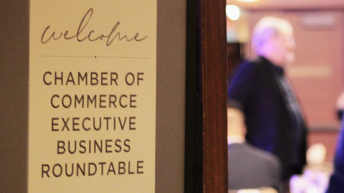 The welcome sign at an Executive Business Roundtable breakfast