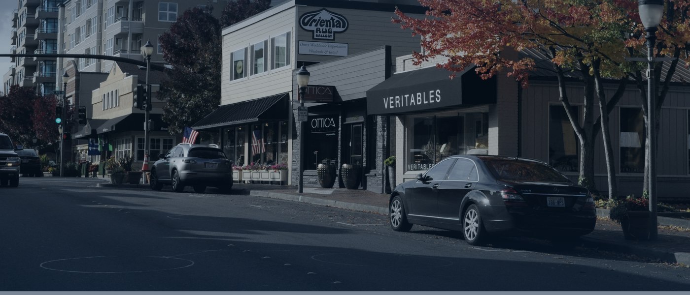 An independent storefront with a glowing open sign