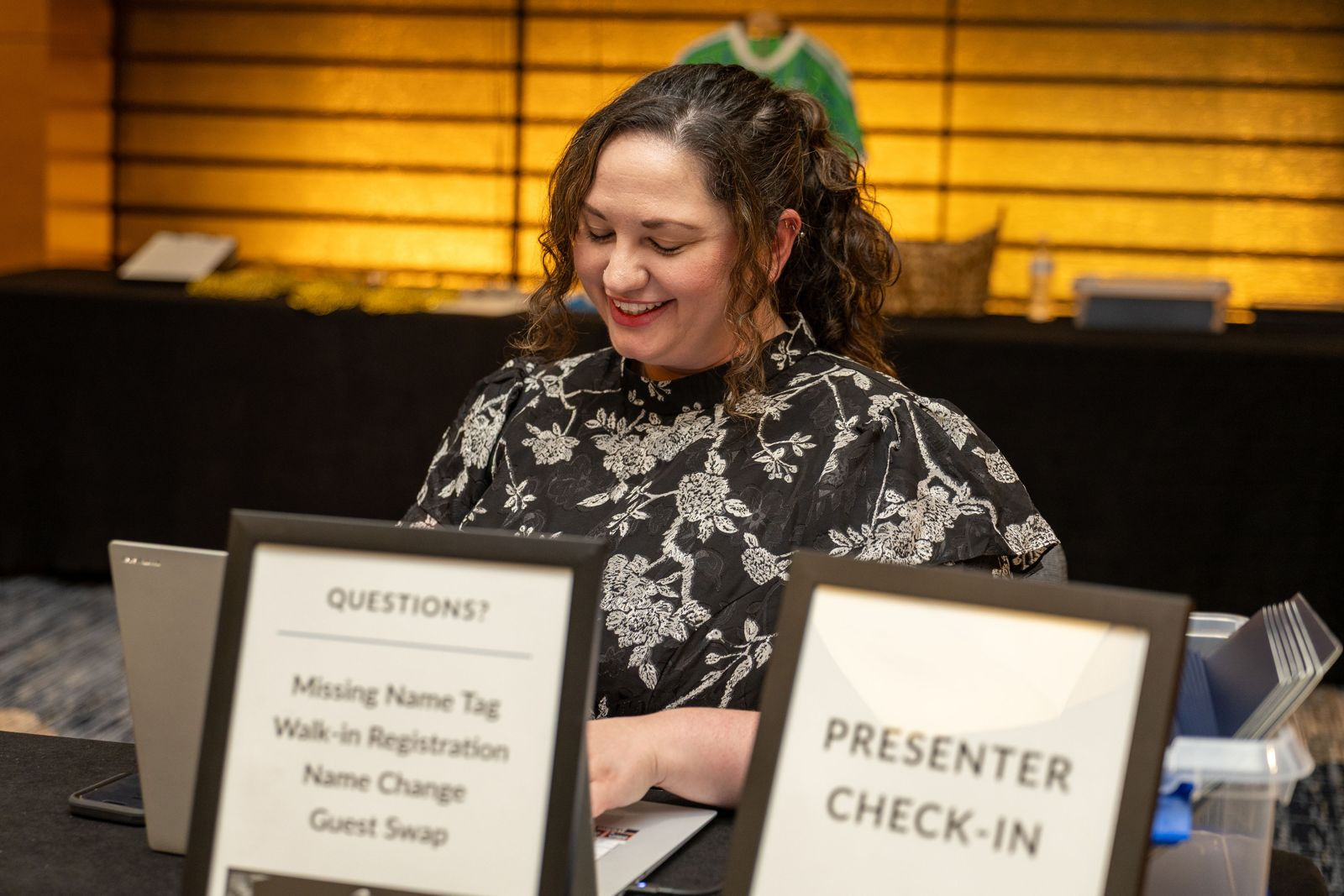 A Chamber team member running the presenter check-in desk