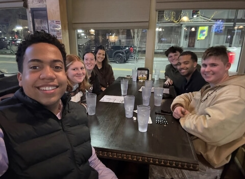 Roz Burgess with the CEO ECU executive board at a team dinner