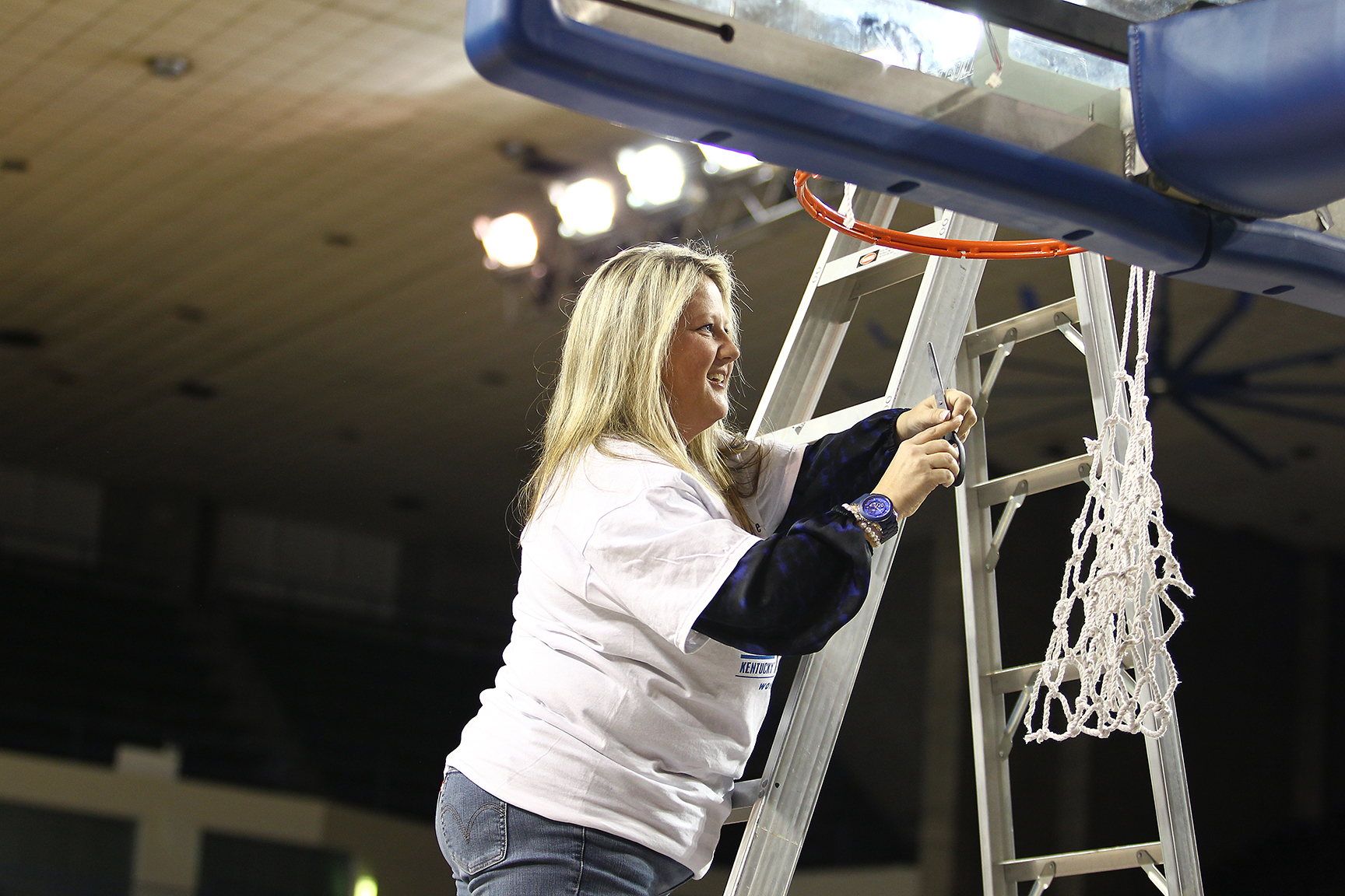 Susan Lax cuts down the nets in 2012