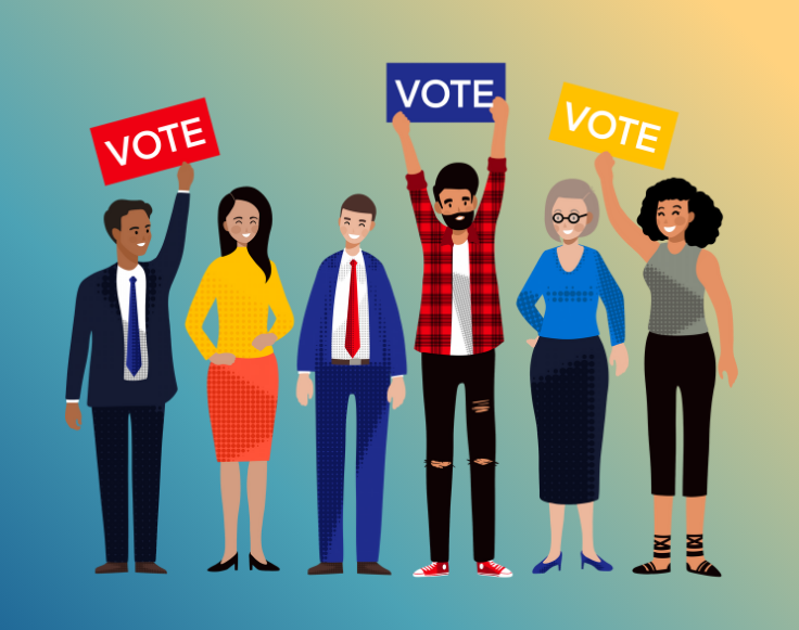 People with voting signs