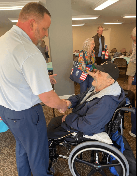 Mike Mortensen visiting Ramsey Village in June of 2026 providing information around Veteran benefits. 