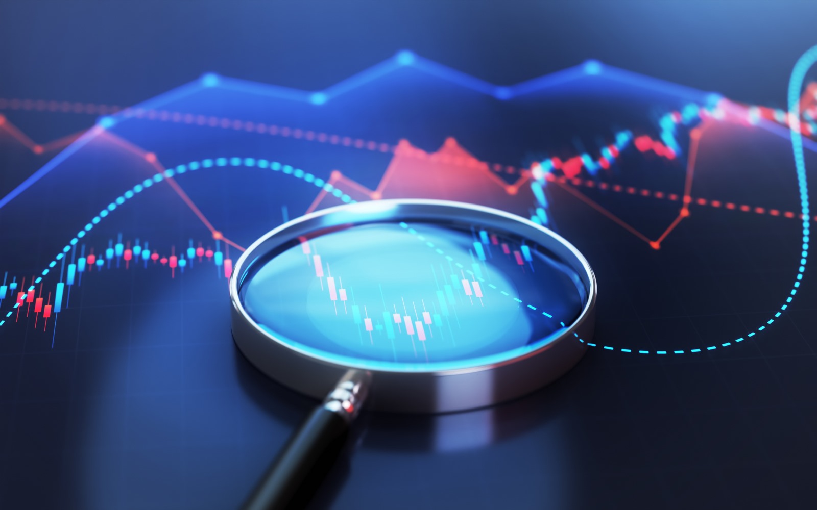Magnifying glass in front of financial chart
