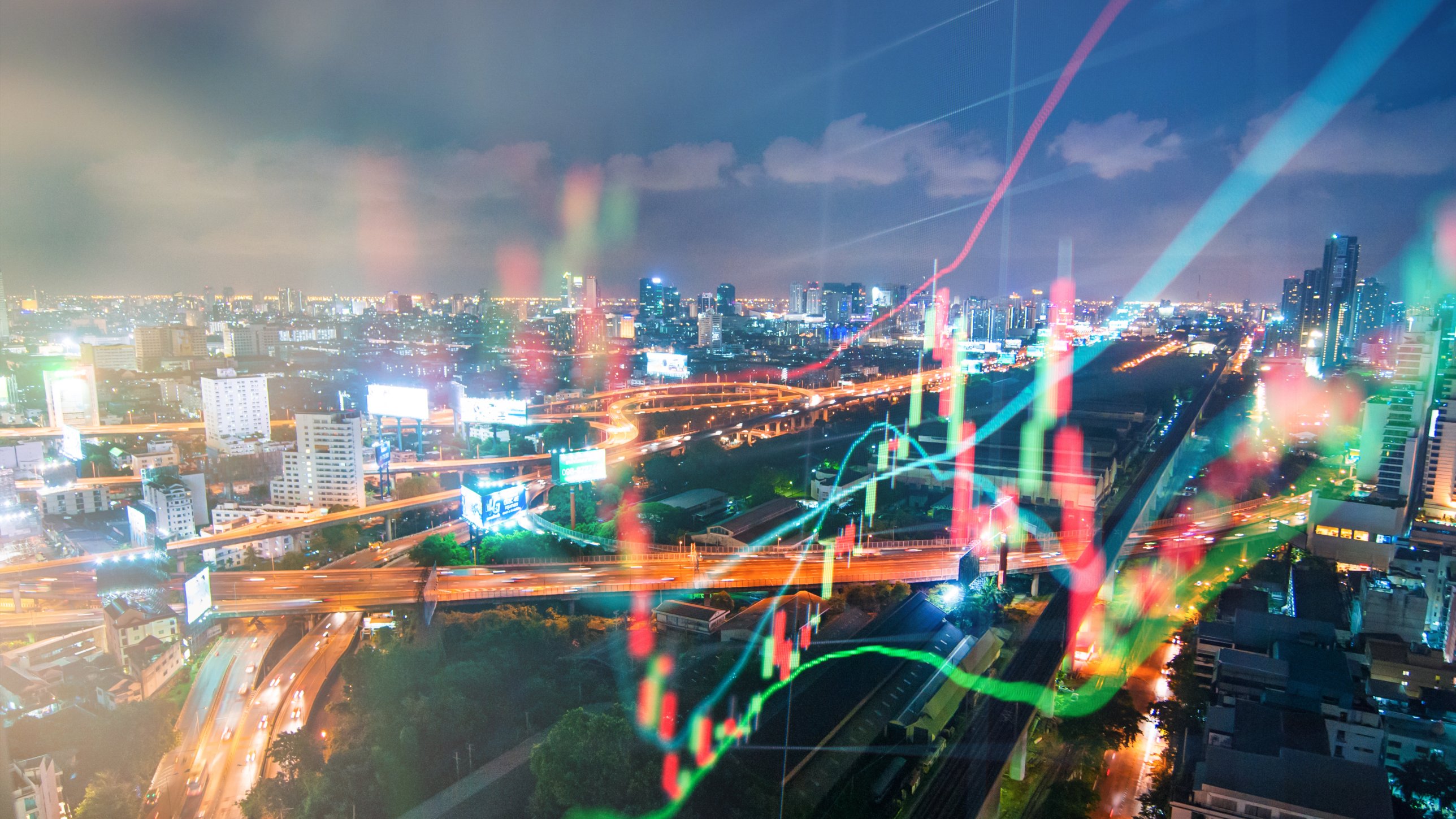 Stock graph images overlayed on a city landscape