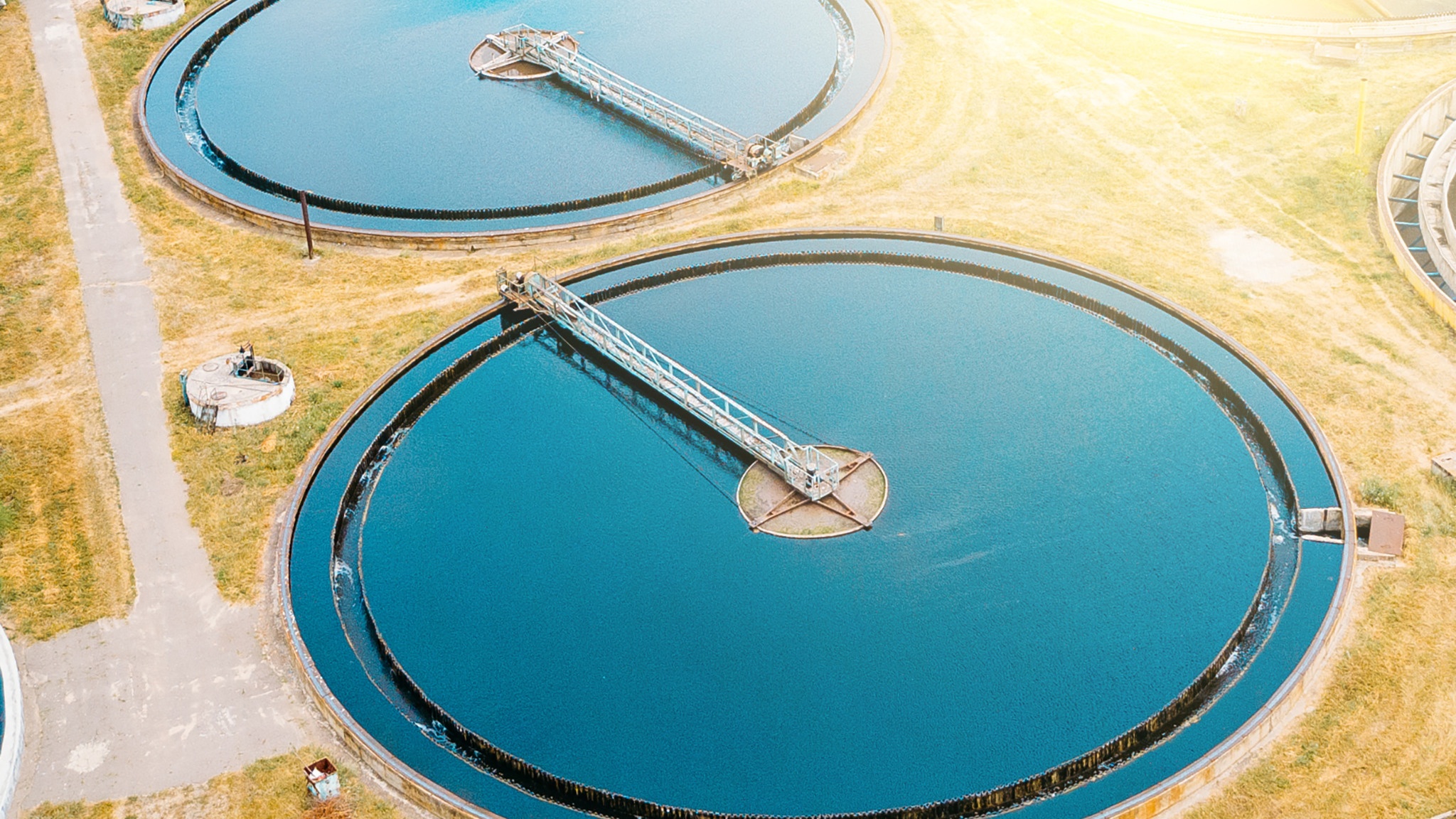 Aerial view of circular water treatment basins.