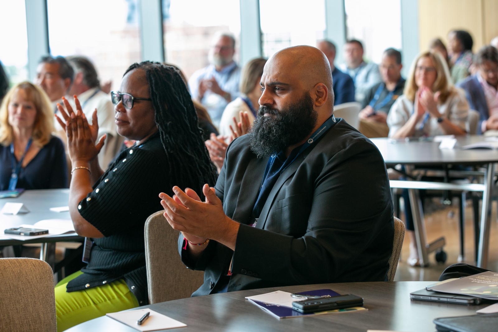 Attendees clap at the 2025 Public Pension Funding Forum