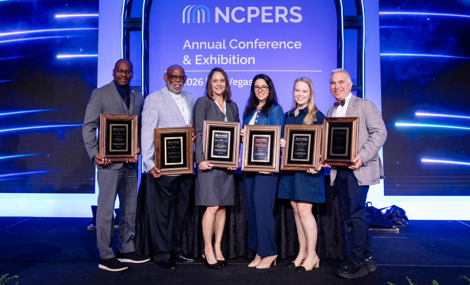 Group photo of the NCPERS Champions & Pension Partners of the Year Award on stage at the 2026 Annual Conference & Exhibition (ACE)