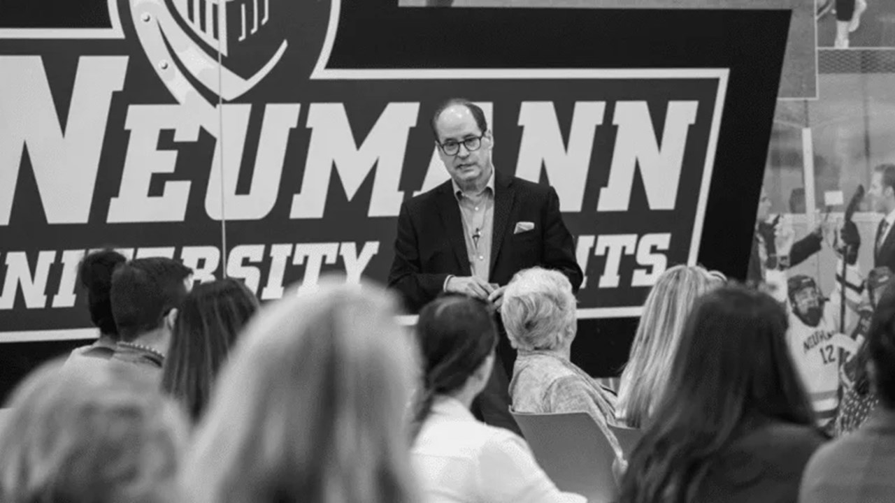 Shawn presenting at Neuman University