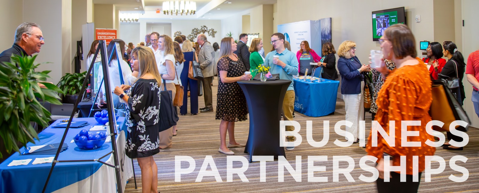 Photo of people browsing a trade show