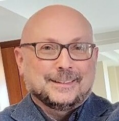 Professional headshot for Rob Collins, Executive Director of Oklahoma Media 