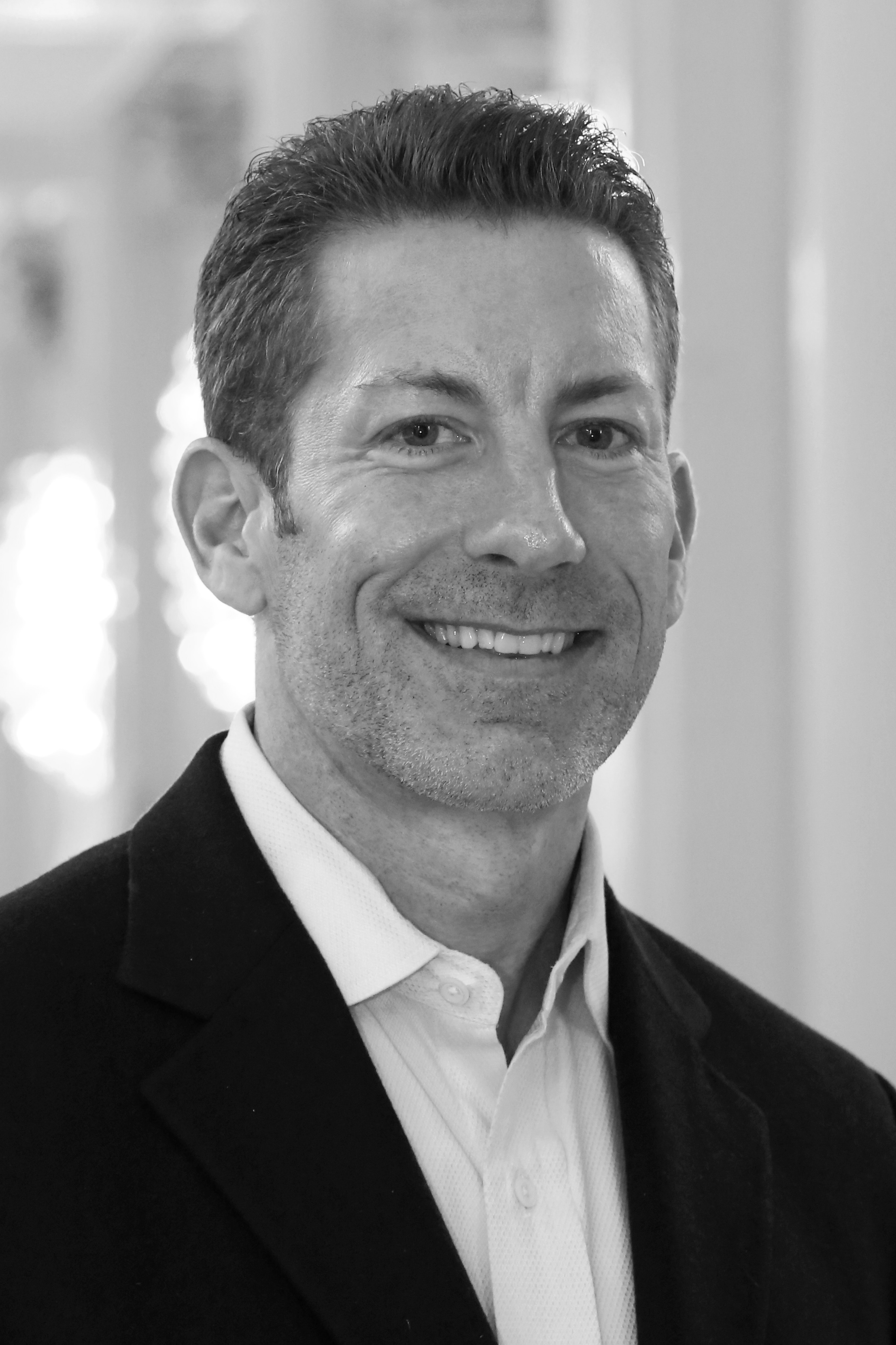 Professional headshot of Steve Latham, Co-Founder and CEO of DonateStock