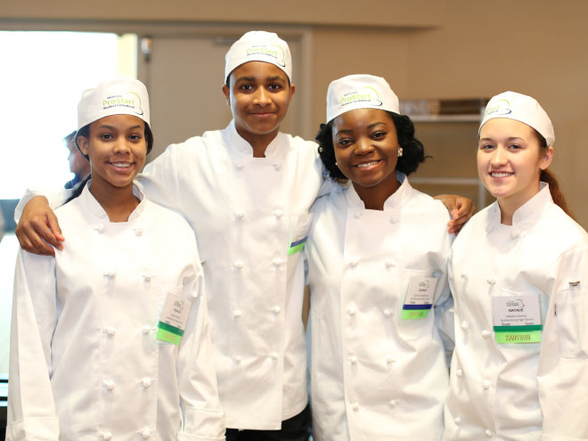 High school chefs pose for a group photo