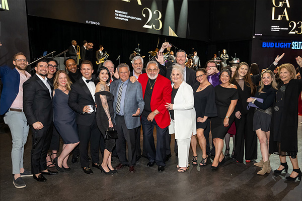 A group photo as a team supports an award winner