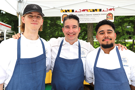 Three chefs at an event