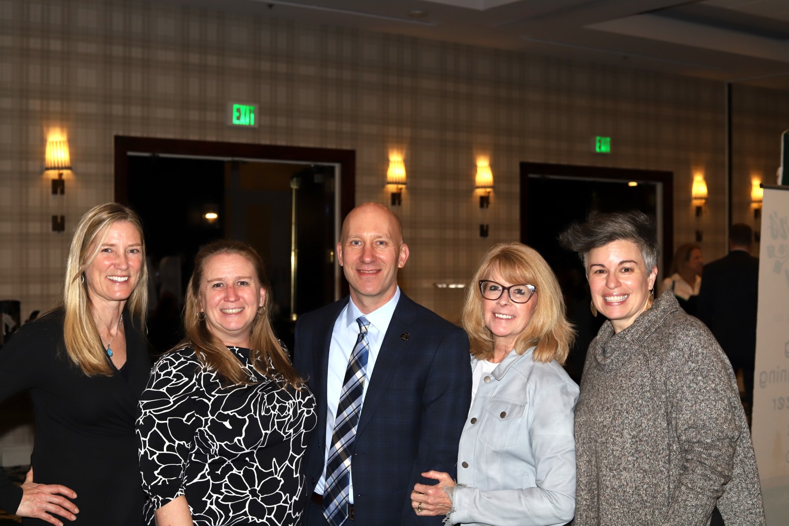 People gather for a photo at the Taste of Maryland event