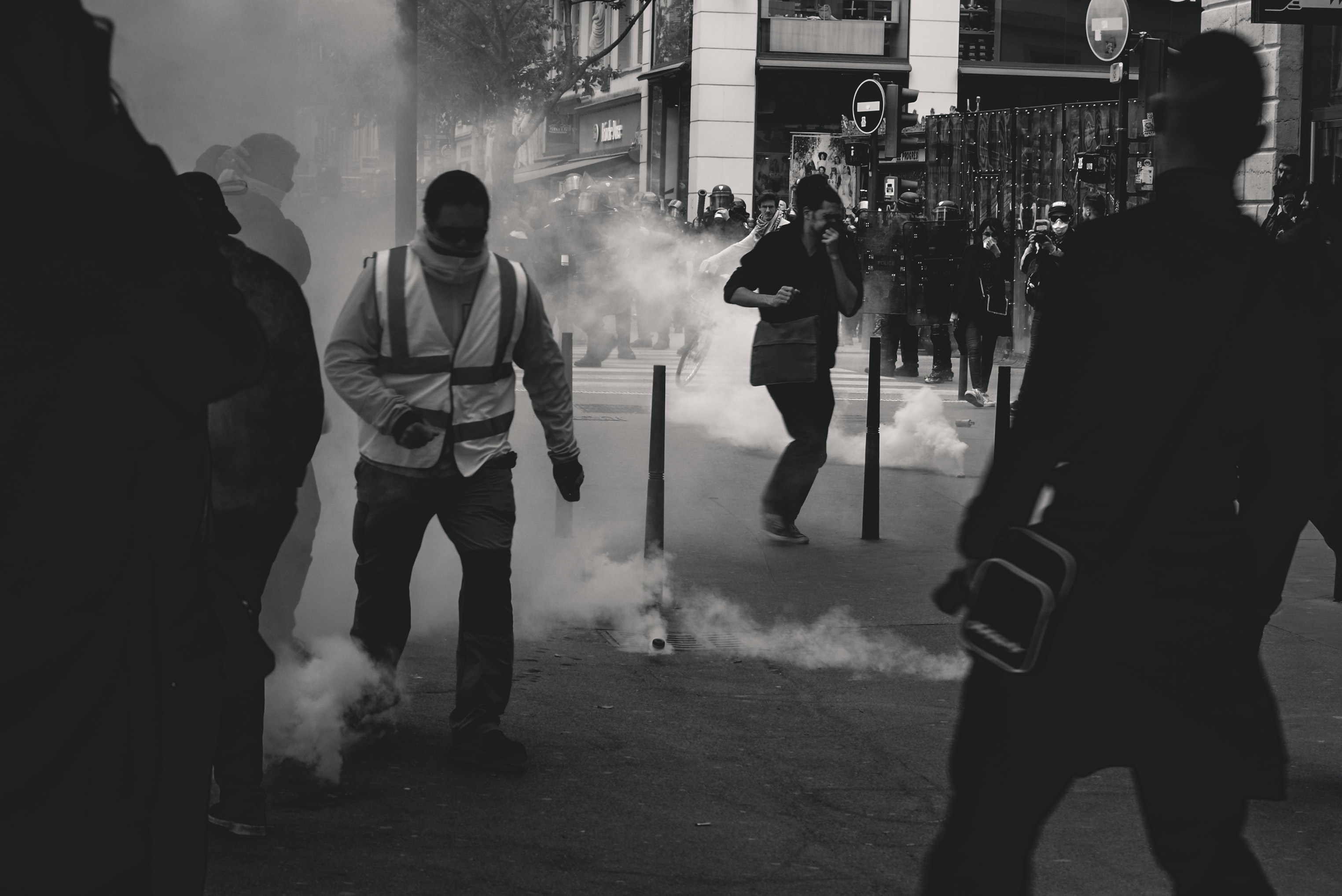 crowd of people with gas masks