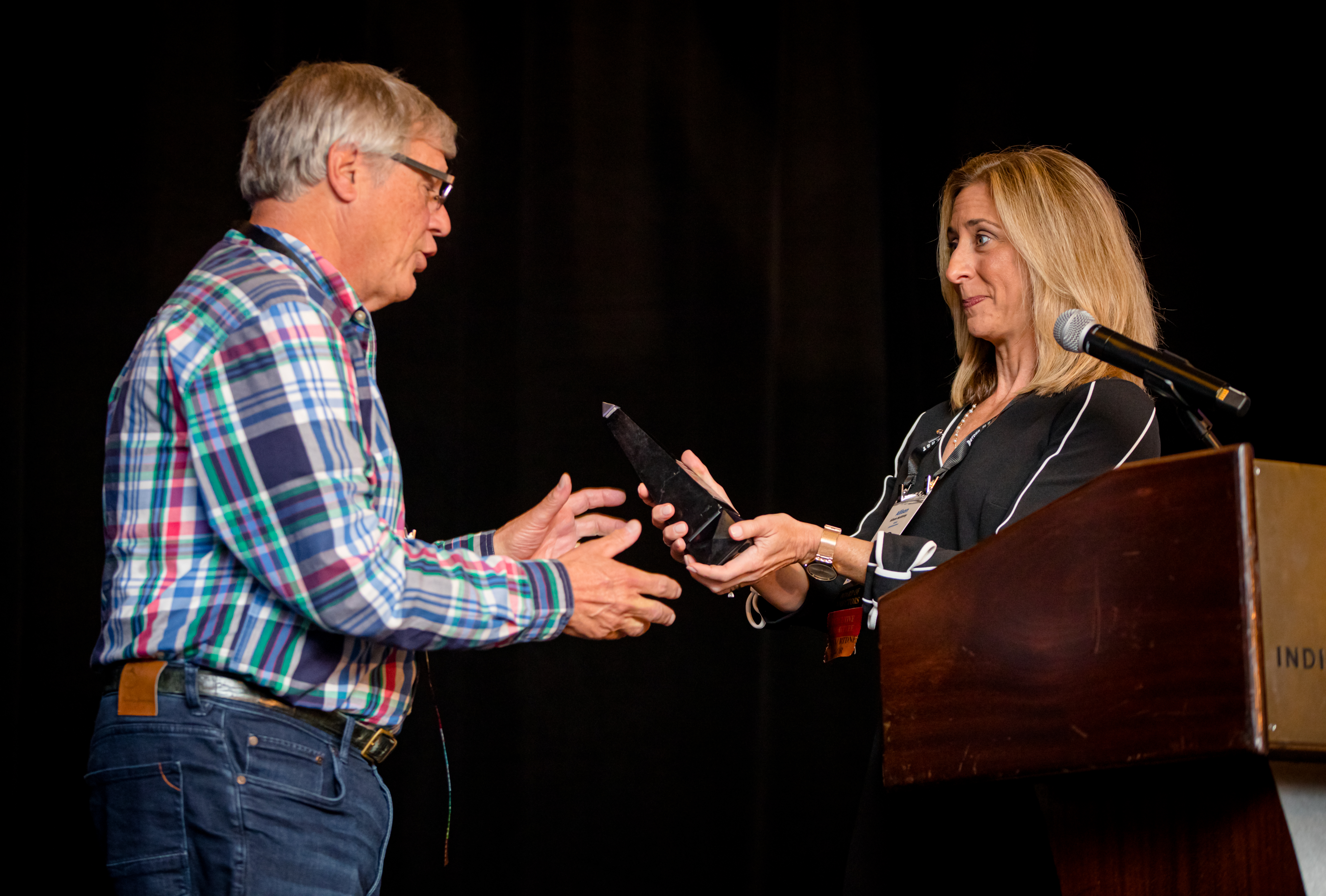 Loren Tobia and Allison McGinley, Tobia accepting Tobia Leadership Award